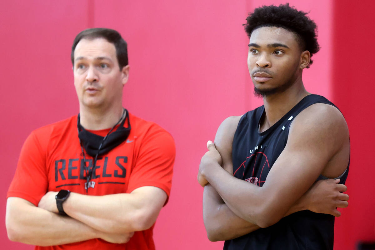 UNLV coach Kevin Kruger with guard Bryce Hamilton after practice at the Mendenhall Center in La ...