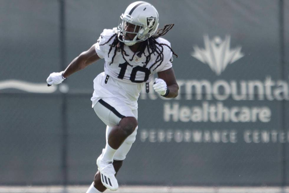 Raiders cornerback Desmond Trufant (10) runs through a drill during a practice session at the R ...