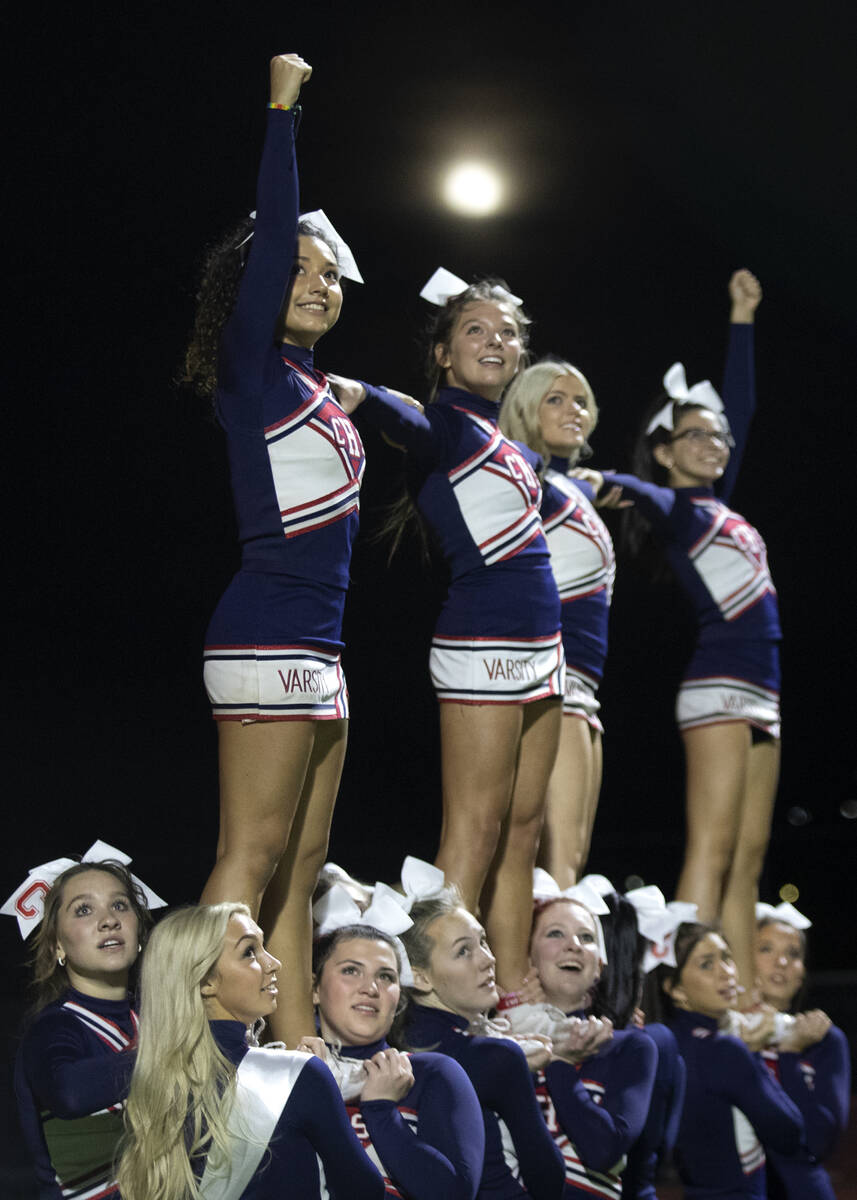 Coronado cheerleaders anticipate a touchdown during the first half of a high school football ga ...