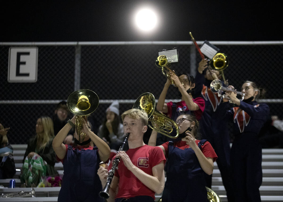 Coronado's marching band plays from the stands during the second half of a high school football ...