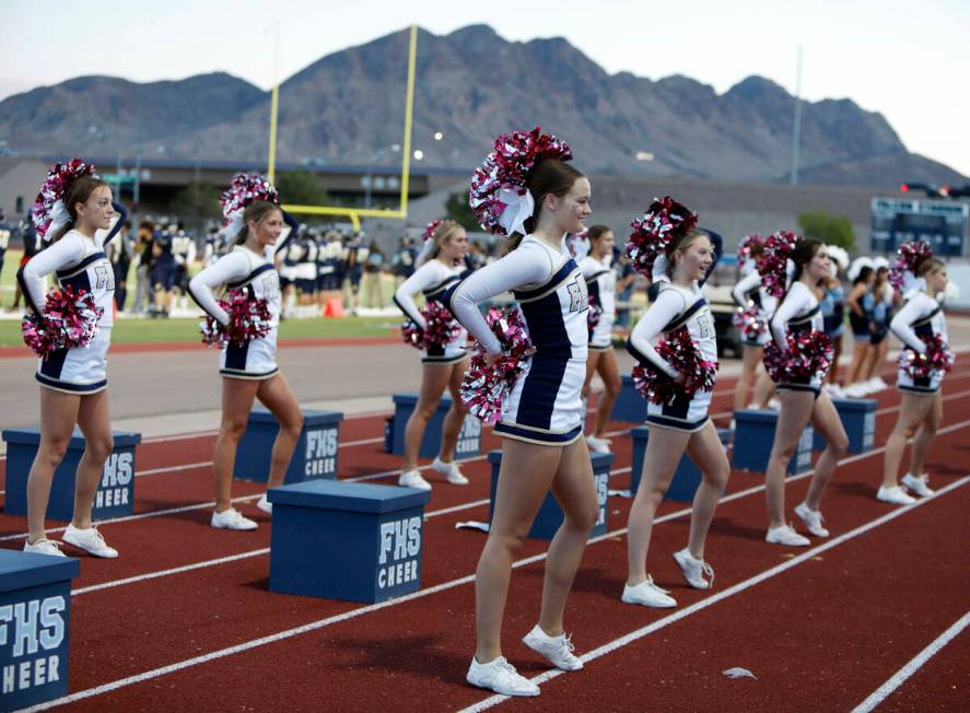 Foothill High School's cheerleaders perform during the first half of a football game at Foothil ...