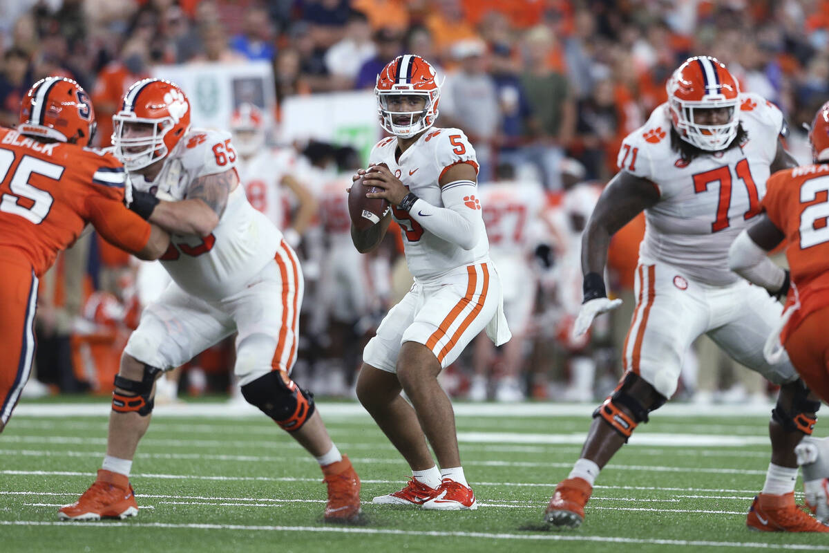 Clemson quarterback D.J. Uiagalelei (5) looks for a receiver during the fourth quarter of the t ...
