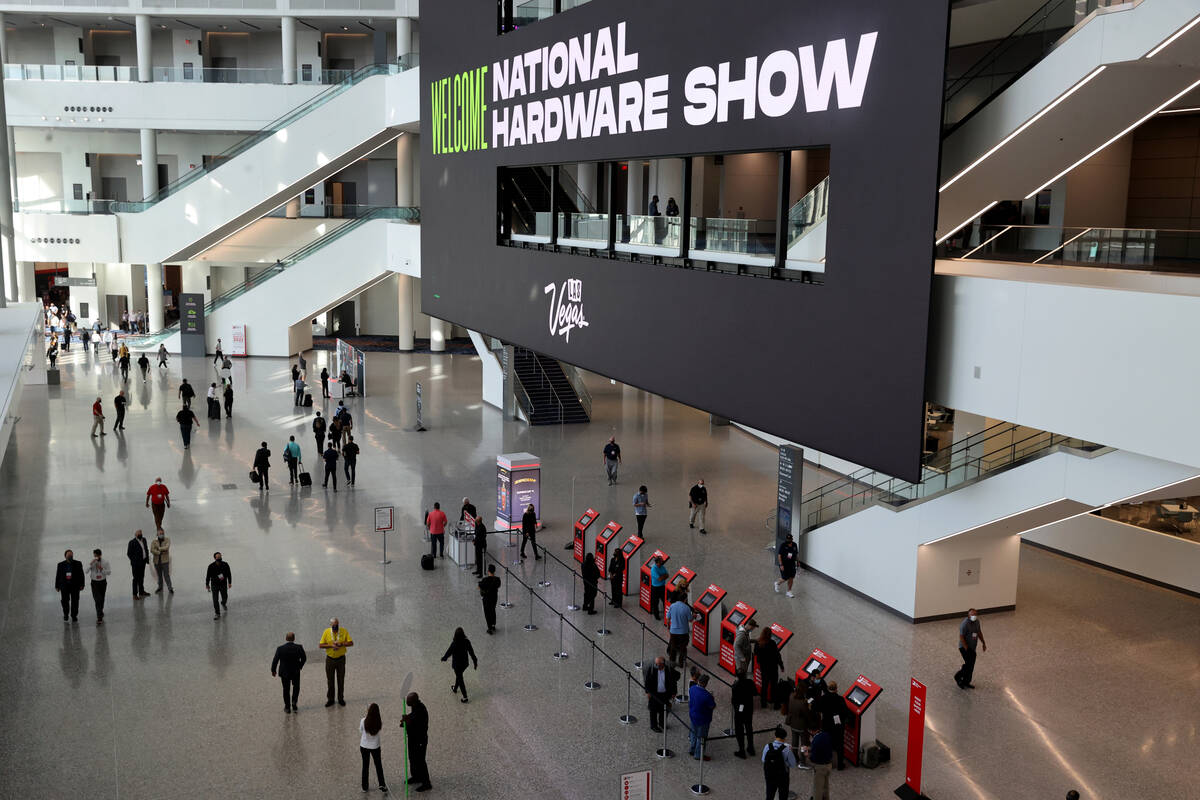 Conventioneers check in on the first day of the 75th annual National Hardware Show at the Las V ...