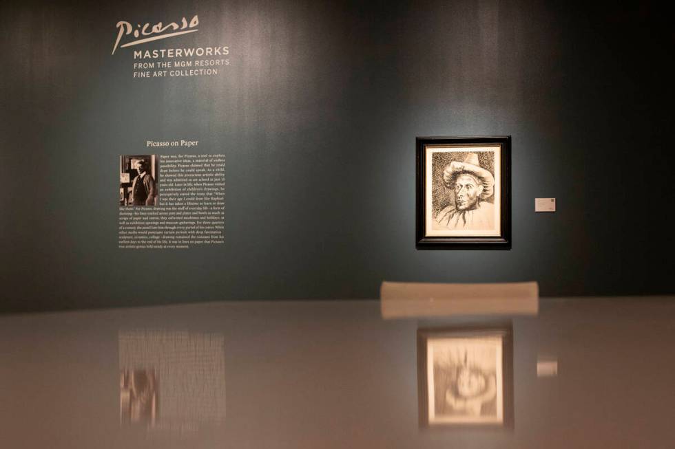 Pablo Picasso's "Pierrot," right, is on display at the Bellagio Gallery of Fine Art on Friday, ...