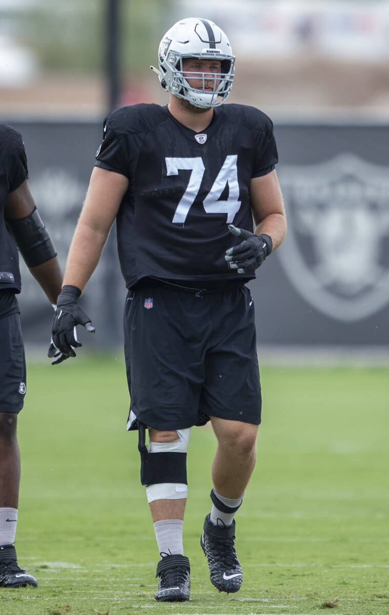 Raiders offensive tackle Kolton Miller (74) is seen wearing a knee brace during a practice sess ...