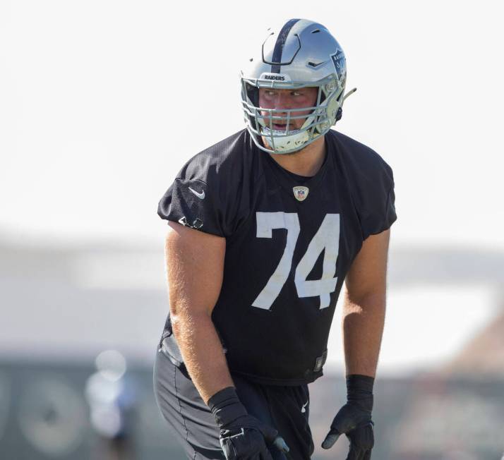 Raiders offensive tackle Kolton Miller (74) sets himself on the field during a practice session ...