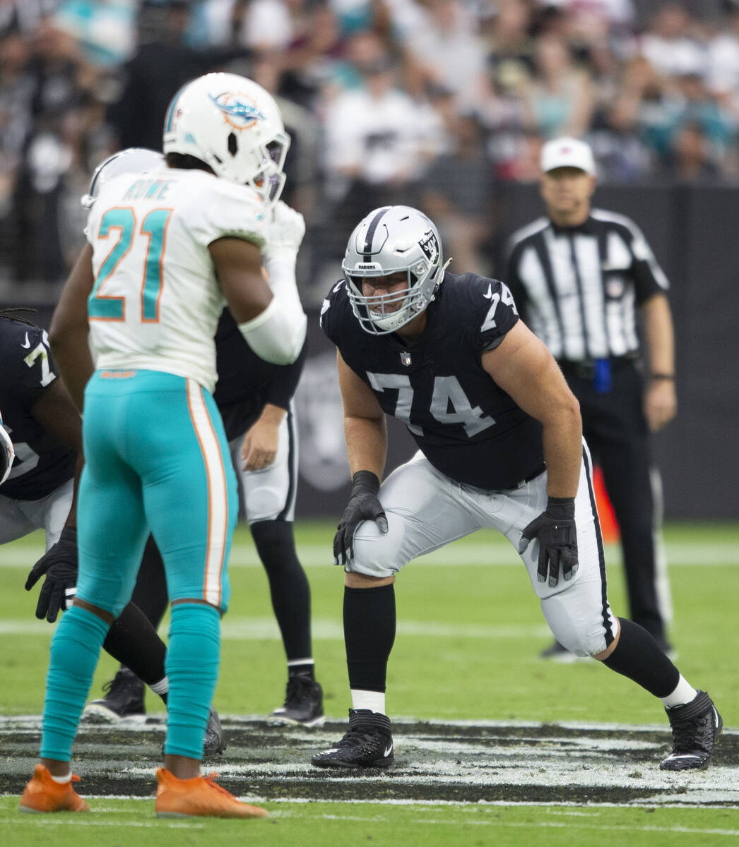 Raiders offensive tackle Kolton Miller (74) lines up opposite Miami Dolphins free safety Eric R ...