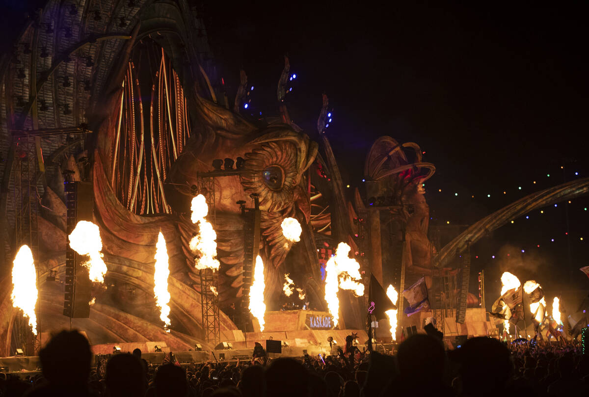 Pyrotechnics go off as Kaskade performs at the Kinetic Field stage during the final day of the ...