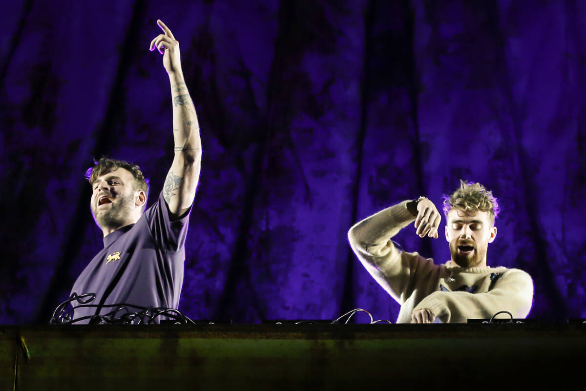 Andrew Taggert, right, and Alex Pall, of The Chainsmokers, perform at the Kinetic Field stage d ...