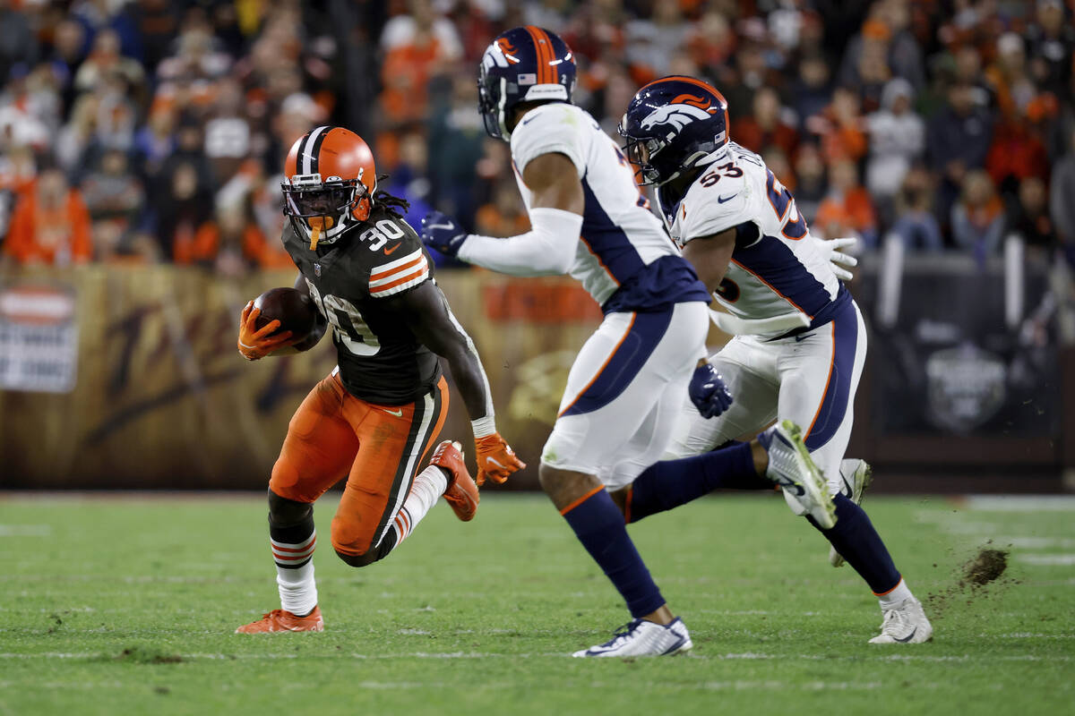 Cleveland Browns running back D'Ernest Johnson (30) runs with the ball during an NFL football g ...
