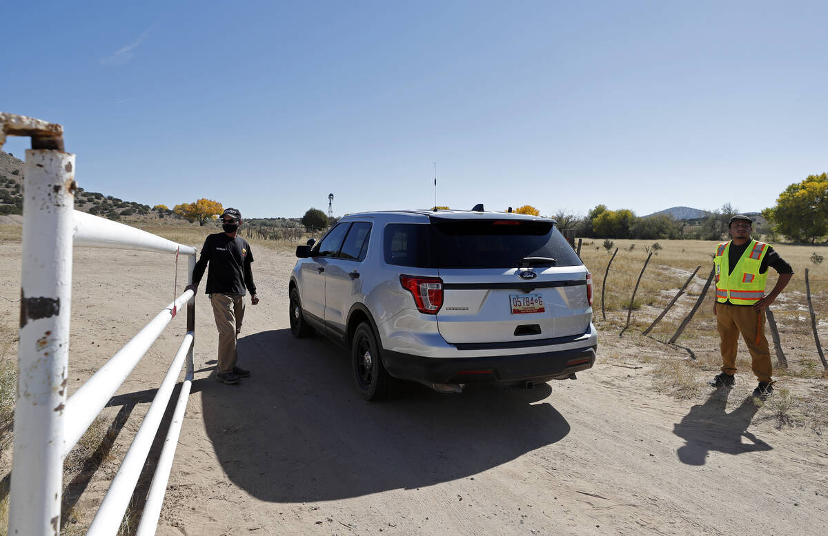 A law enforcement vehicle enters the Bonanza Creek Film Ranch in Santa Fe, N.M., Friday, Oct. 2 ...