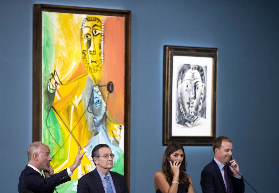 Bids are given during an auction held by Sotheby's featuring eleven of Pablo Picasso’s w ...