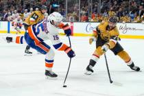 New York Islanders right wing Cal Clutterbuck (15) shoots in front of Vegas Golden Knights defe ...