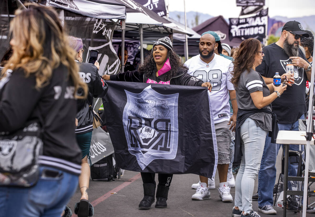 The Raider Riders from Los Angeles parade through tailgating before the first half of an NFL ga ...