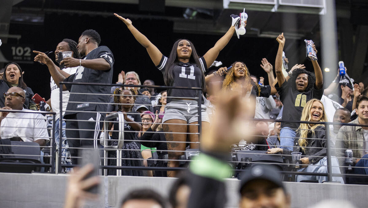 Raiders fans celebrate another score over the Philadelphia Eagles during the second half of an ...