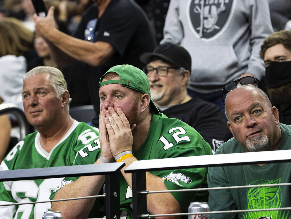 Philadelphia Eagles fans watch their team loosing to the Raiders during the second half of an N ...