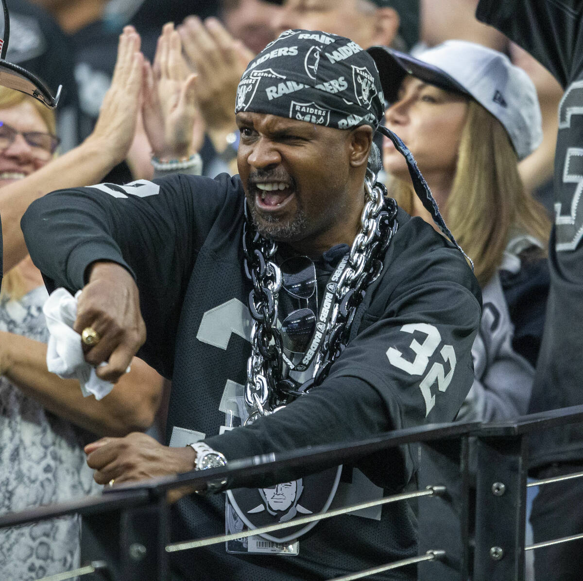 A Raiders fan celebrates during the third quarter of an NFL football game against the Philadelp ...