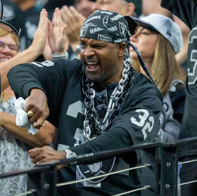 A Raiders fan celebrates during the third quarter of an NFL football game against the Philadelp ...