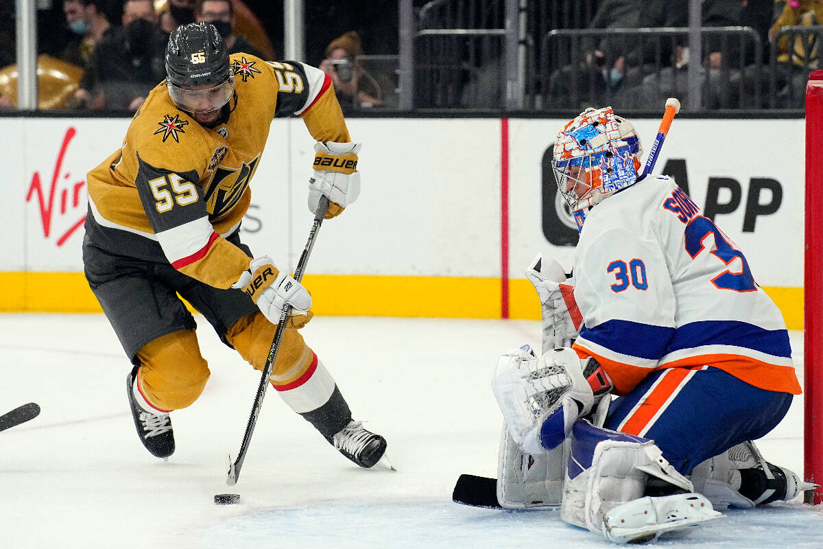 Golden Knights Keegan Kolesar tries to score on New York Islanders goaltender Ilya Sorokin (30) ...