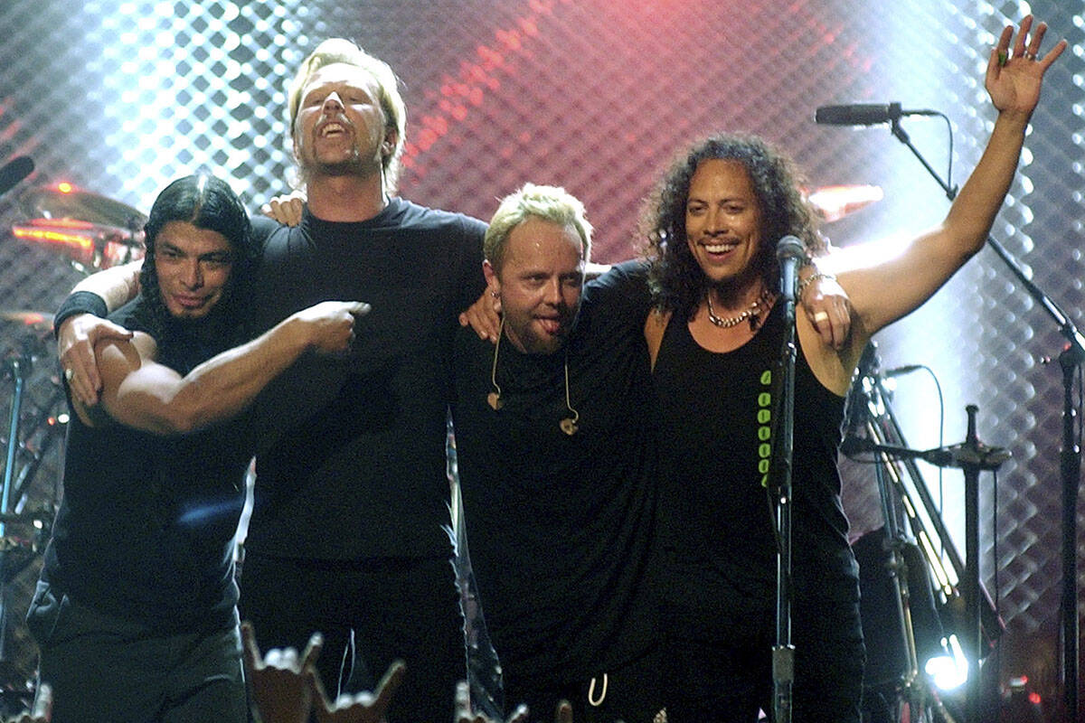 From left, Robert Trujillo, James Hetfield, Lars Ulrich and Kirk Hammett of Metallica take a bo ...