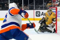 Vegas Golden Knights goalie Robin Lehner (90) makes a save against New York Islanders left wing ...