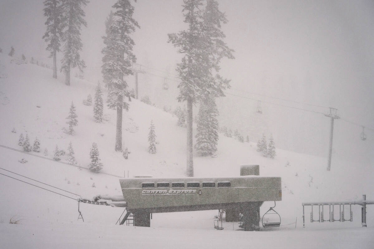 In this photo provided by Mammoth Mountain Ski Area, snow falls on Mammoth Mountain, Monday, Oc ...