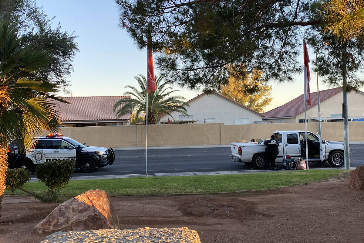 Las Vegas police process a vehicle on East Harmon Avenue early Tuesday. The vehicle was located ...