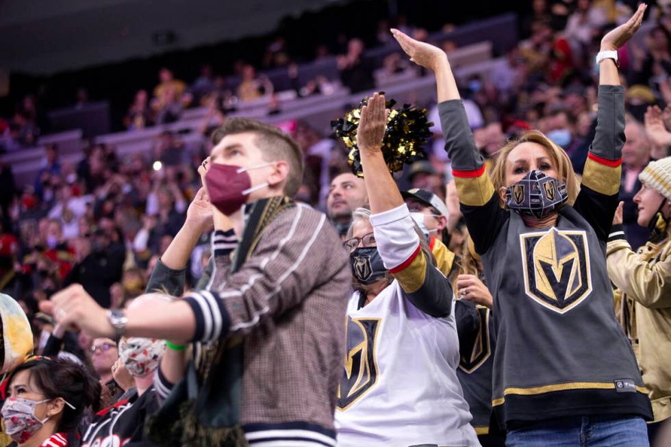 Golden Knights fans celebrate a goal scored by Golden Knights center William Karlsson (71) duri ...