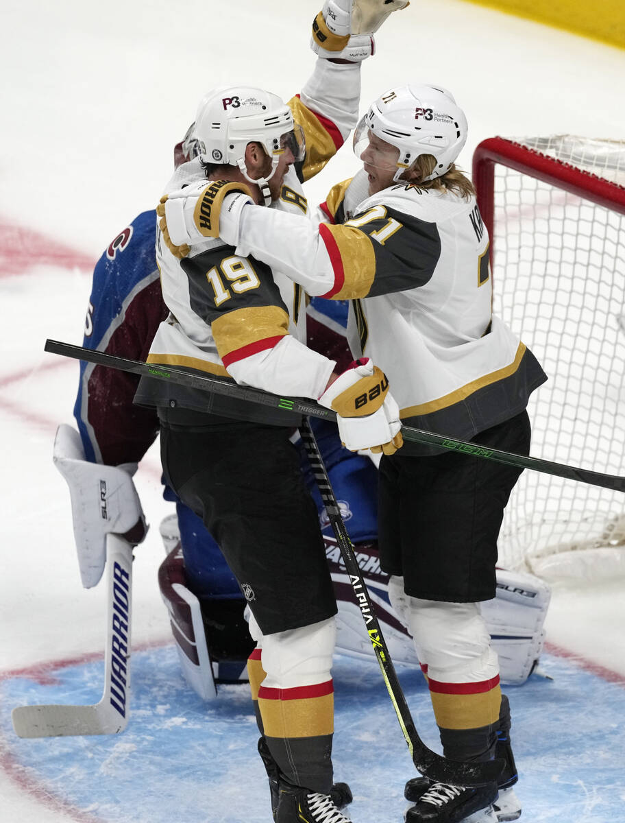 Vegas Golden Knights center William Karlsson, front right, celebrates scoring a goal with right ...