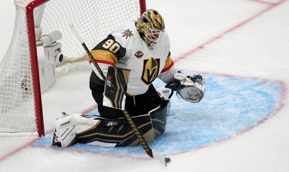 Vegas Golden Knights goalie Robin Lehner makes a stick save of a shot while facing the Colorado ...