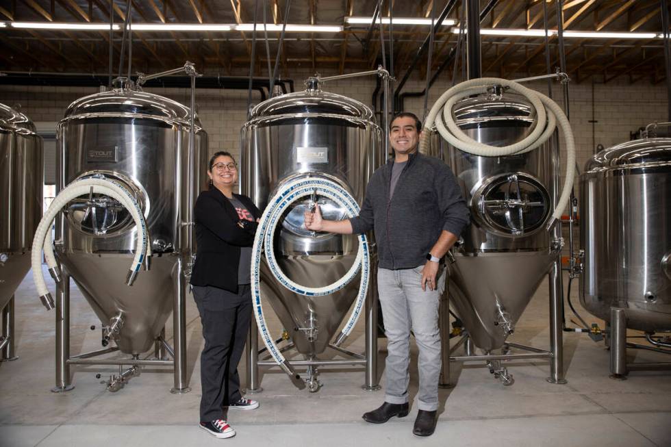 Amanda Payan, left, and her brother, Matt, co-owners of North 5th Brewing Co., pose for a portr ...