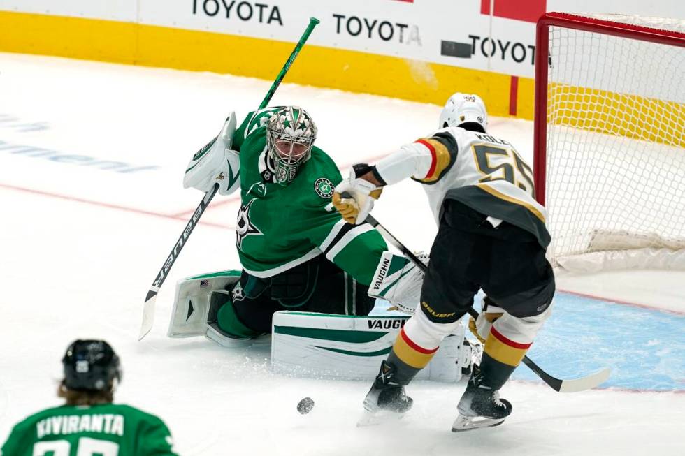 Dallas Stars goaltender Anton Khudobin (35) defends against pressure from Vegas Golden Knights ...