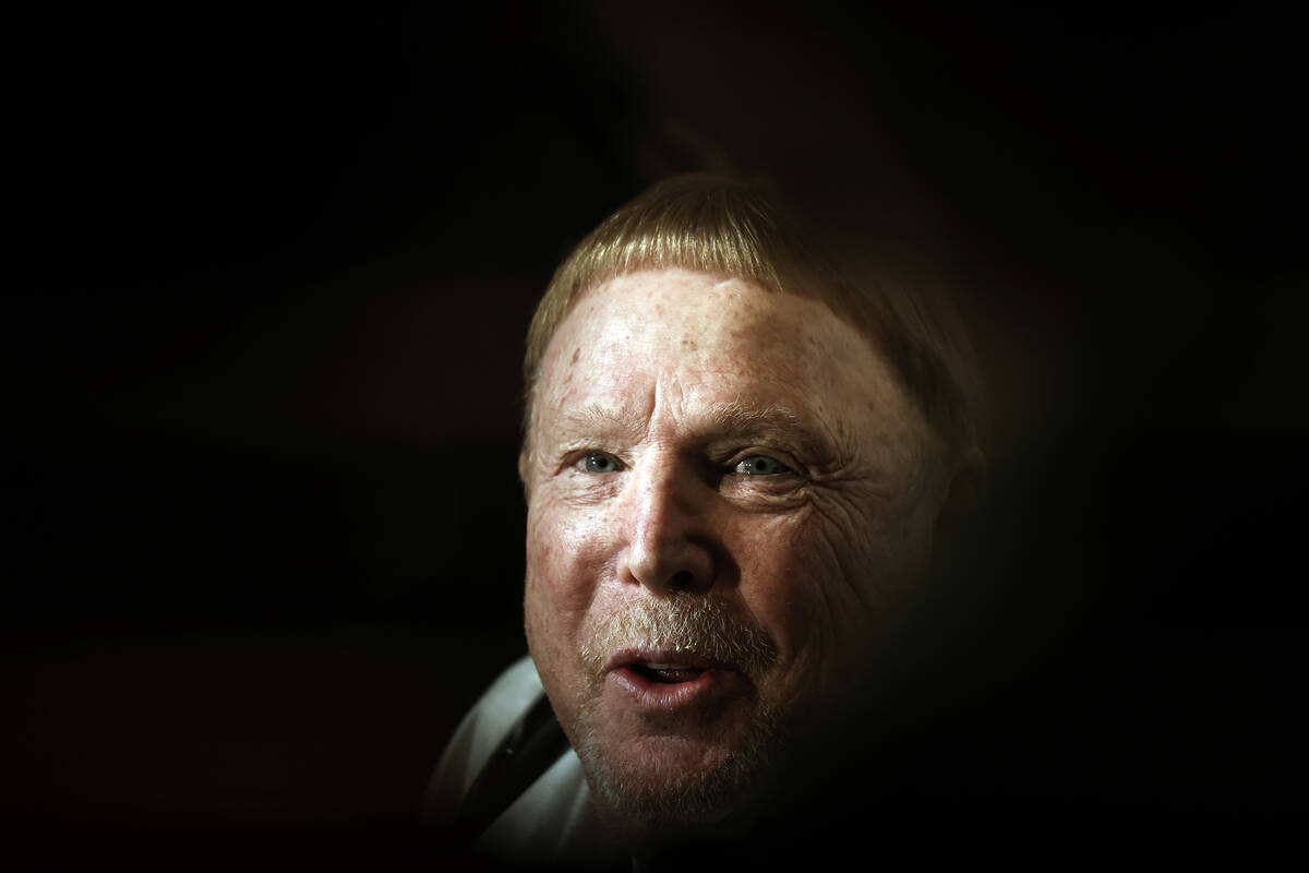 Mark Davis, owner of the Las Vegas Raiders, talks to reporters as he leaves the NFL owners meet ...