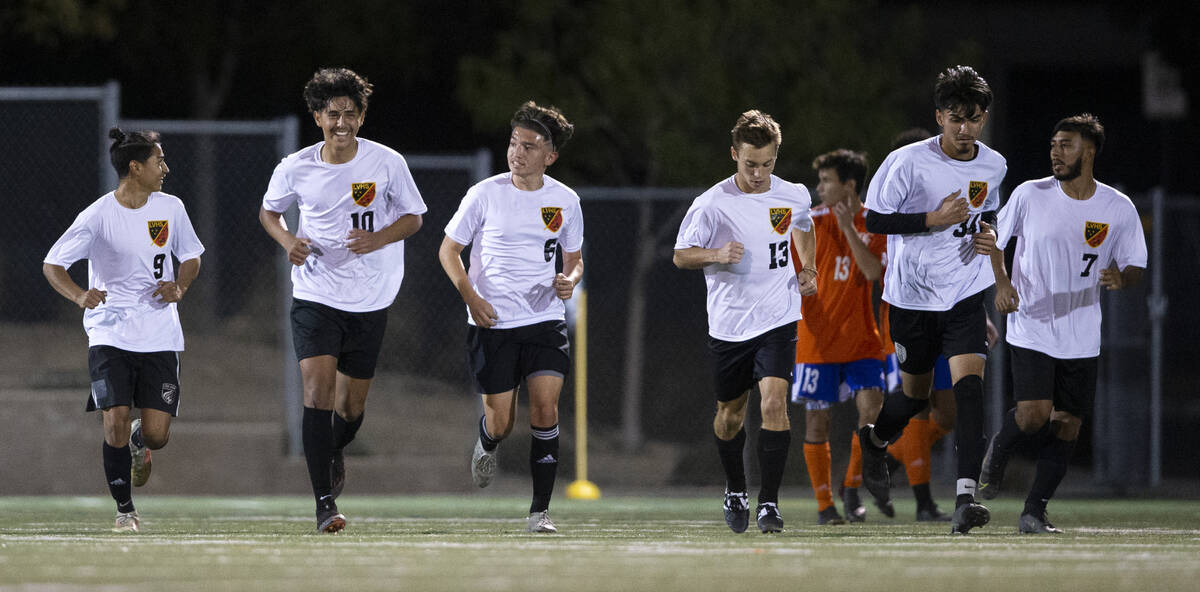 Las Vegas' players run back into play after Master Carrasco (10) scored a goal on Bishop Gorman ...