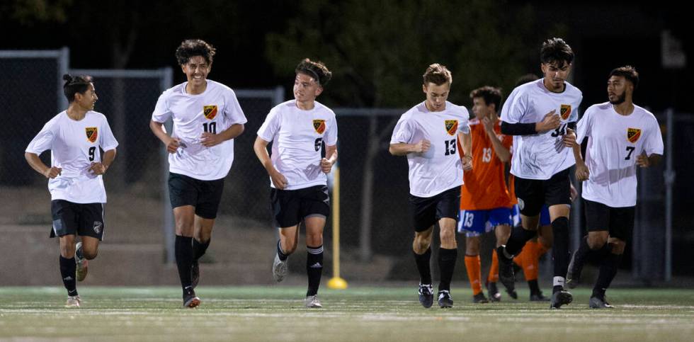 Las Vegas' players run back into play after Master Carrasco (10) scored a goal on Bishop Gorman ...