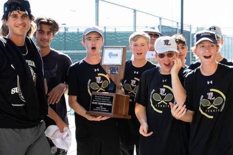 Faith Lutheran players celebrate after wining Class 5A team championship tennis match against P ...