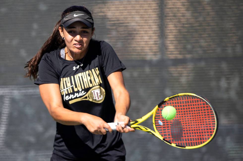 Faith Lutheran's Arianna Van Howweling hits to Palo Verde's Jessica Bernales during a girls sin ...