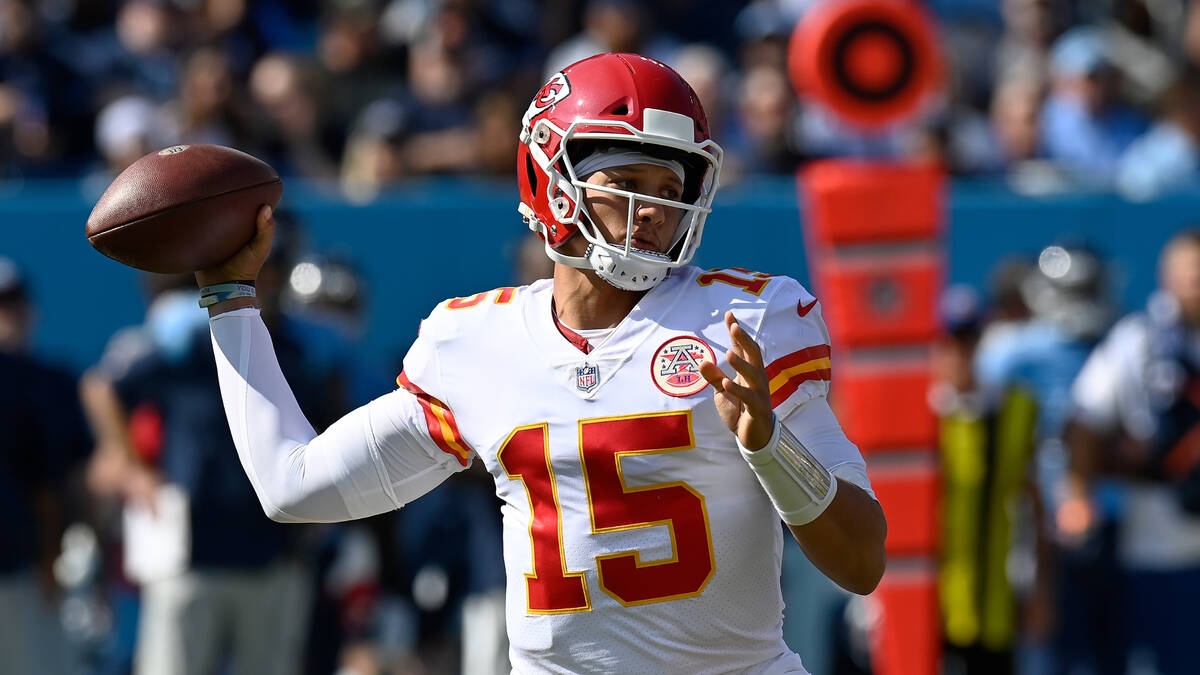 Kansas City Chiefs quarterback Patrick Mahomes plays against the Tennessee Titans in an NFL foo ...