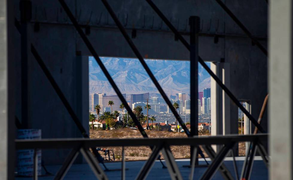 A partial view of the Las Vegas Strip is seen as construction continues on the second building ...