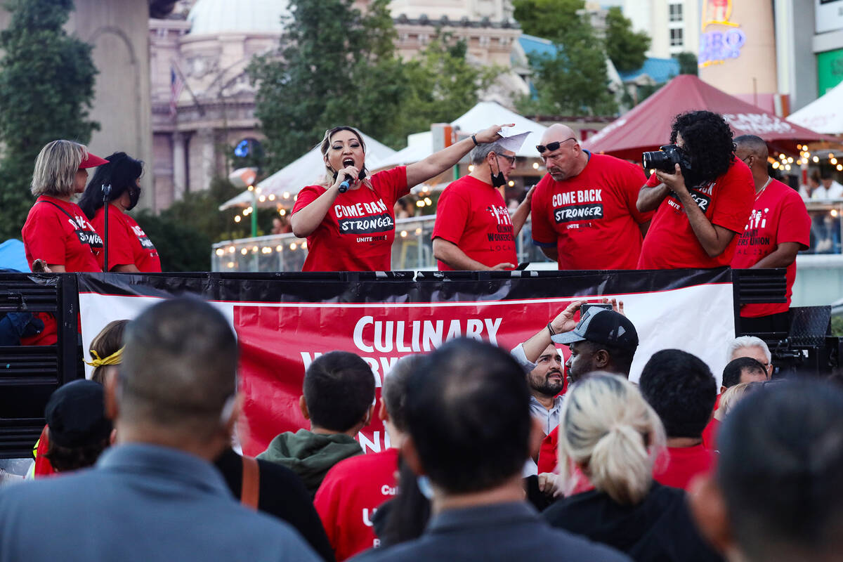 Elizabeth Renteria, a guest room attendant for Caesars Palace, addresses the crowd at a rally ...