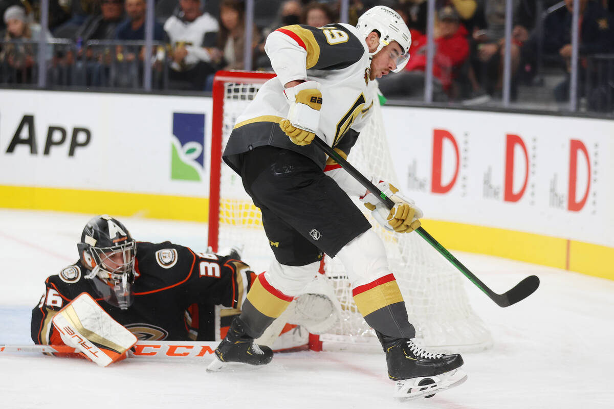 Vegas Golden Knights right wing Reilly Smith (19) under pressure from Anaheim Ducks goaltender ...