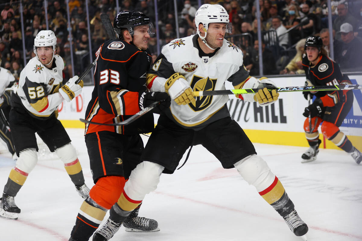 Anaheim Ducks right wing Jakob Silfverberg (33) battles Vegas Golden Knights defenseman Brayden ...