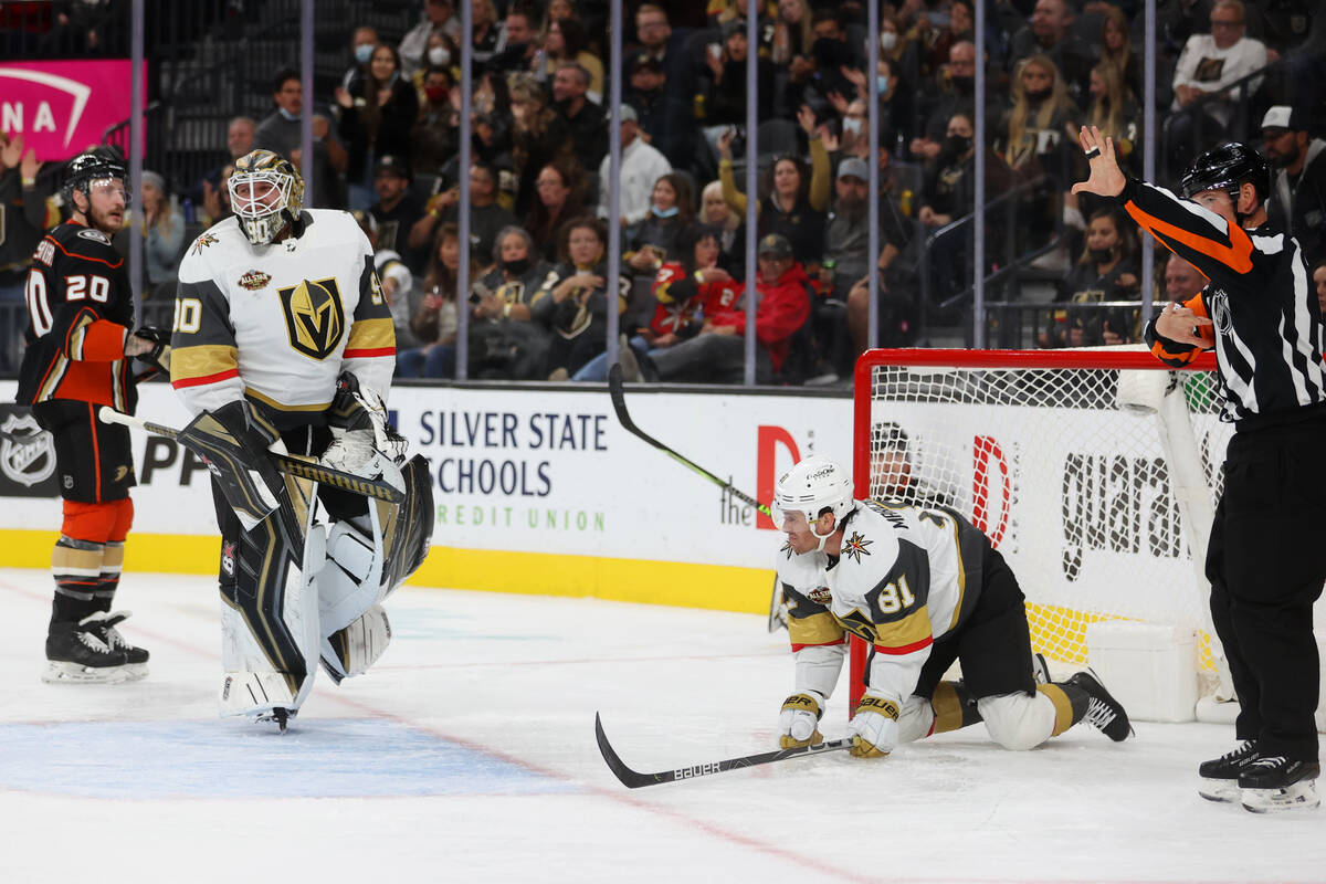 Vegas Golden Knights center Jonathan Marchessault (81) crashes into the goal while defending ag ...