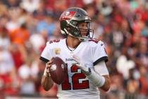 Tampa Bay Buccaneers quarterback Tom Brady (12) attempt a pass during an NFL football game agai ...