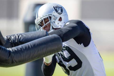Raiders defensive end Clelin Ferrell (99) works through the tackle posts during a practice sess ...