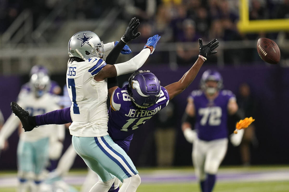 Dallas Cowboys defensive back Trevon Diggs (7) breaks up a pass intended for Minnesota Vikings ...
