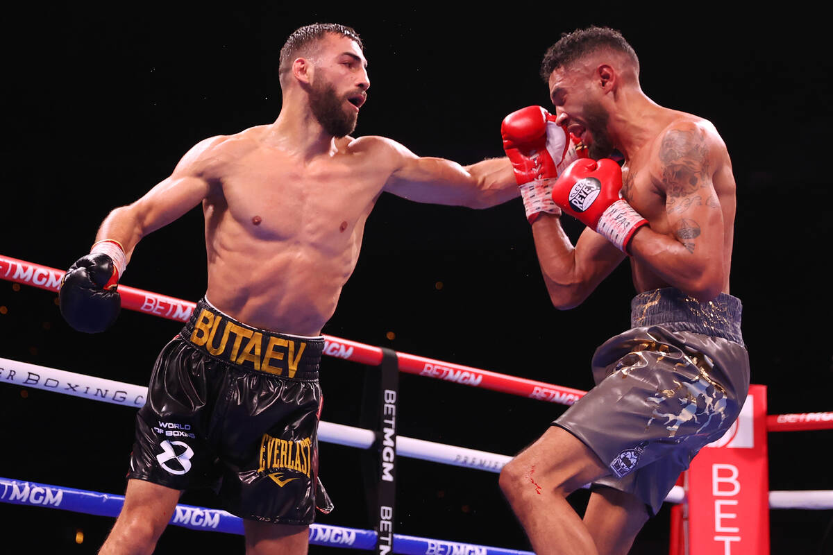 Radzhab Butaev, left, connects a punch against Jamal James in the fifth round of the WBA World ...