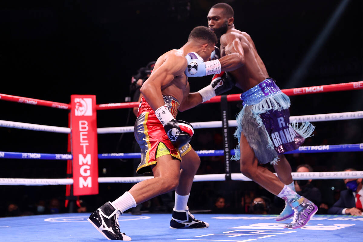 Jaron Ennis connects a punch against Thomas Dulorme in the first round of a welterweight bout a ...