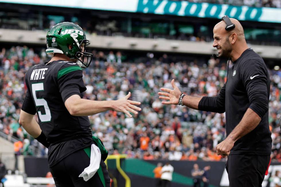 New York Jets quarterback Mike White (5) reacts with head coach Robert Saleh against the Cincin ...