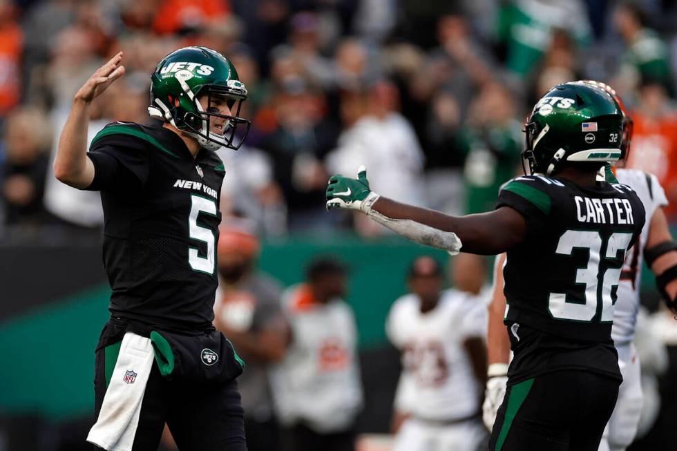 New York Jets quarterback Mike White (5) reacts after defeating the Cincinnati Bengals in an NF ...
